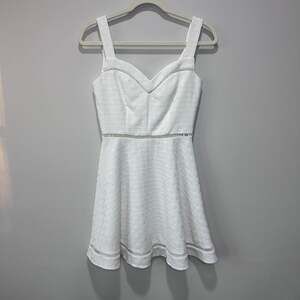 B. Darlin White Textured Fit & Flare Mini Dress with Crochet Ladder Trim Detail,